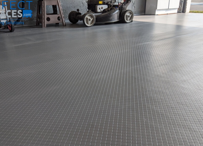 PVC coin mat roll used for vehicle garage and workshop flooring